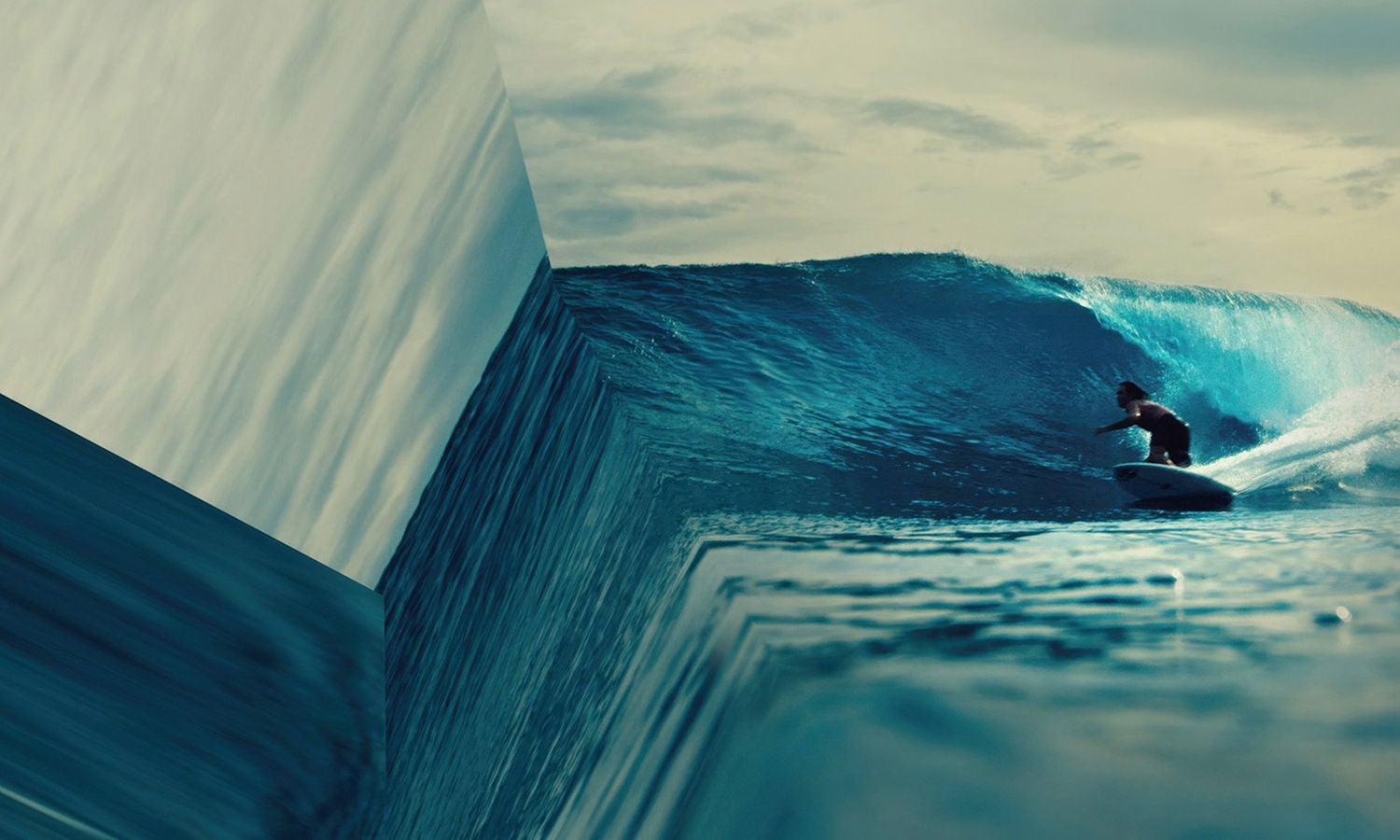 Surfer riding a wave toward a surreal ocean edge that appears to drop into space.​